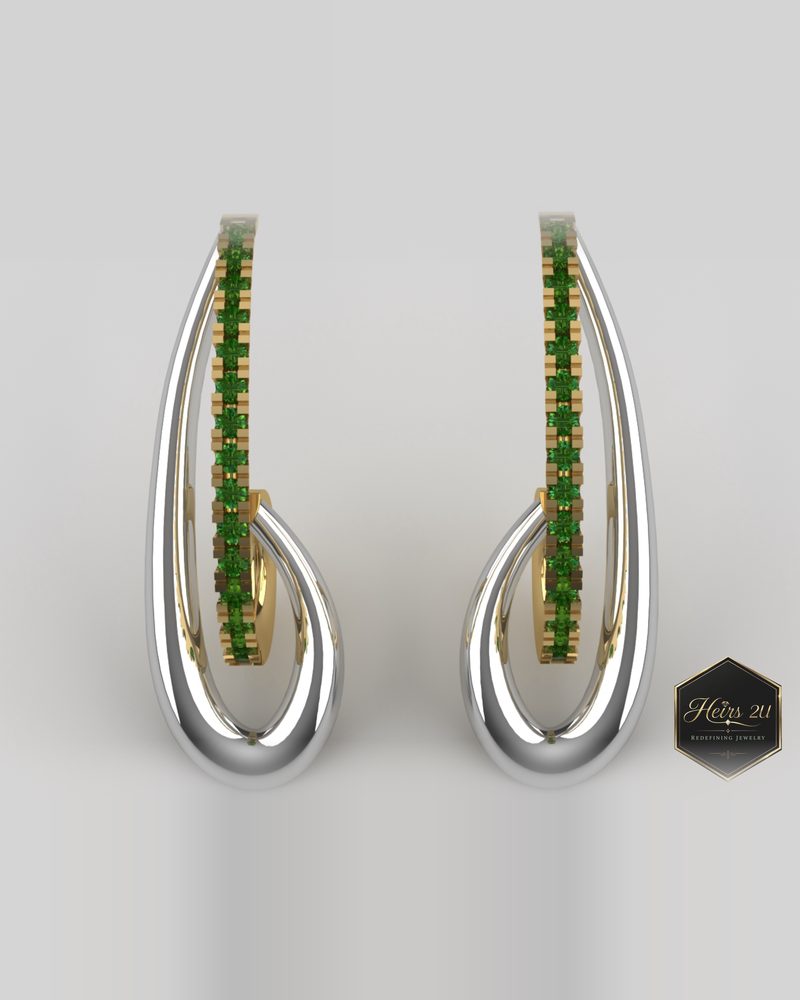 Elongated open-drop white metal earrings set with a channel of green peridots