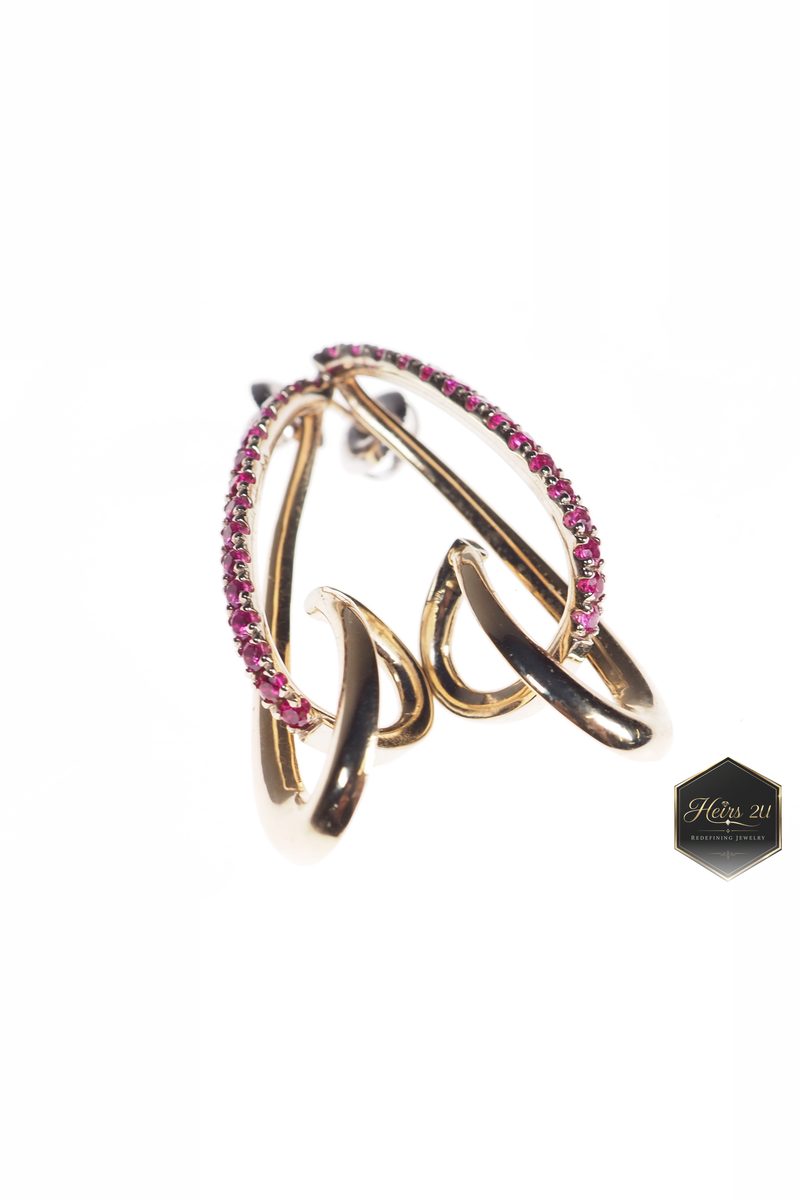 The Jacque Earring — an interlocking rose gold ear climber set with pink stones