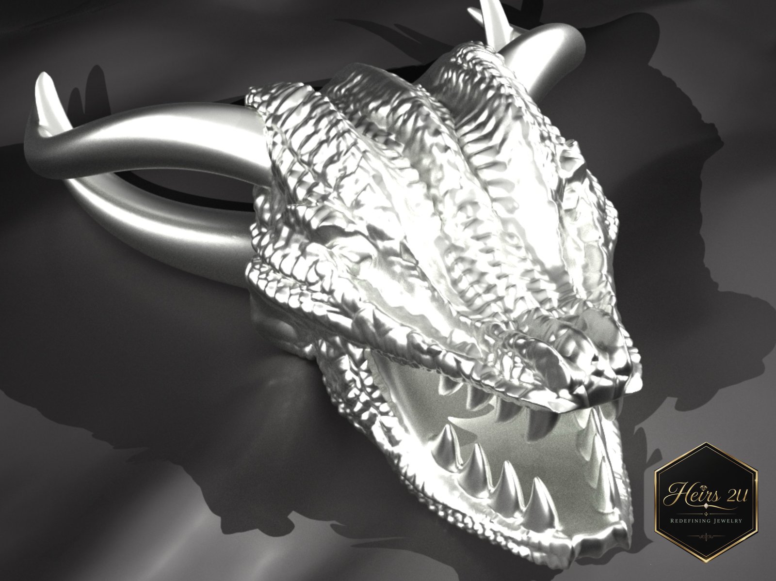 A sculpted dragon head pendant modelled in fine scale detail